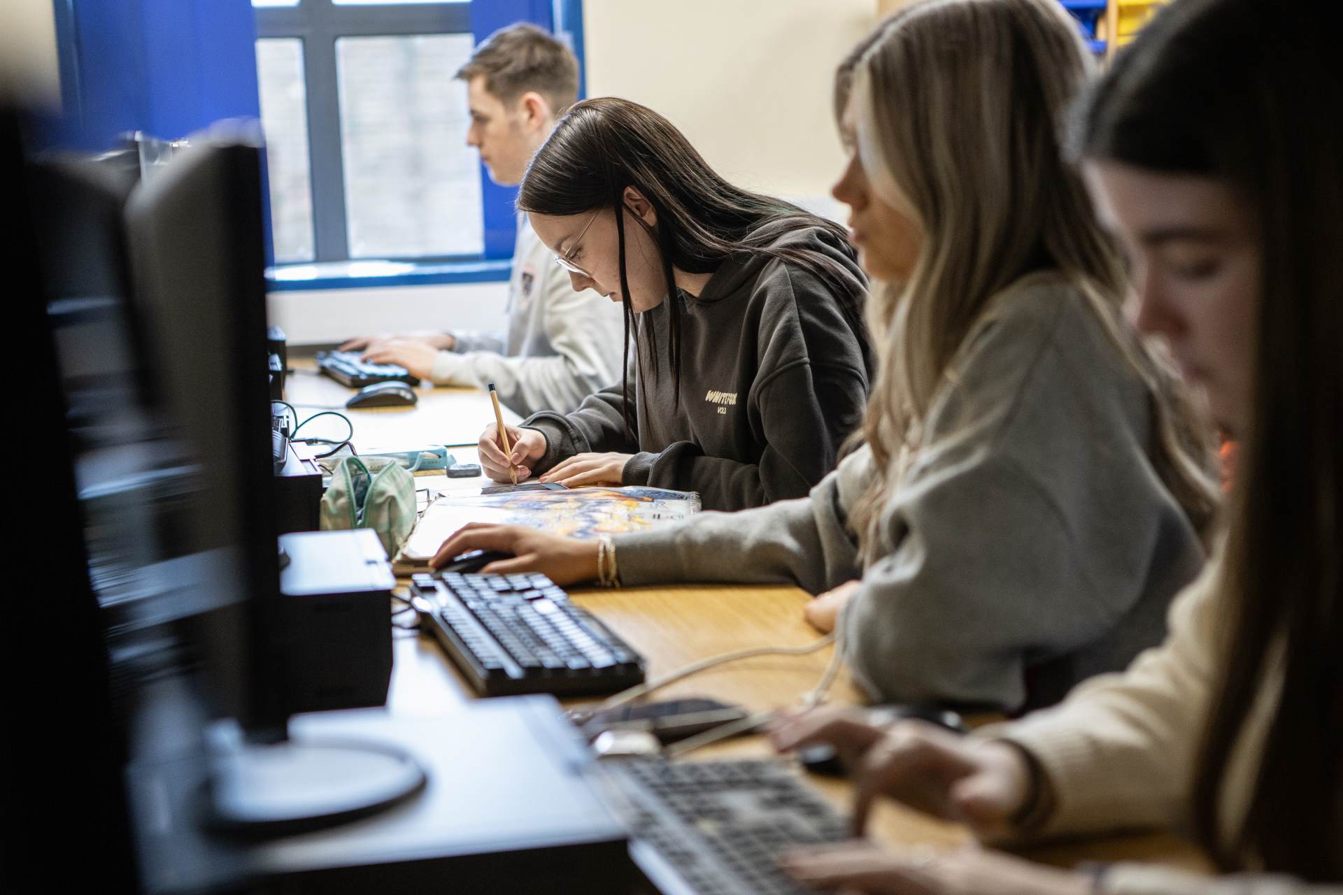 Sixth form students studying